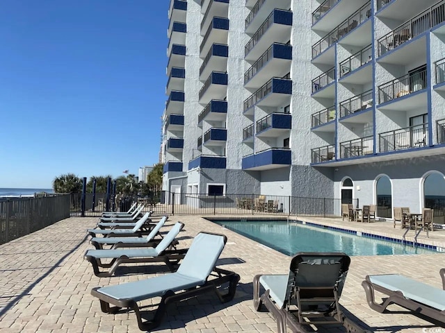 2001 S Ocean Blvd Unit 815, Myrtle Beach, SC 29577 - community pool featuring a patio area