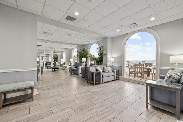 2001 S Ocean Blvd Unit 815, Myrtle Beach, SC 29577 - building lobby with a drop ceiling and a textured wall