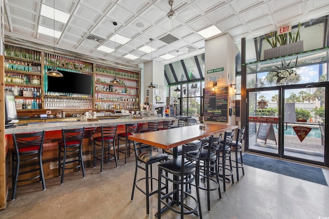 2001 S Ocean Blvd Unit 815, Myrtle Beach, SC 29577 - dining space featuring a community bar and concrete flooring