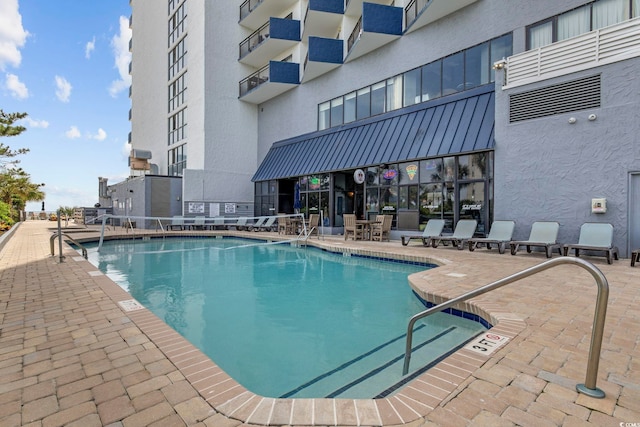 2001 S Ocean Blvd Unit 815, Myrtle Beach, SC 29577 - community pool featuring a patio area