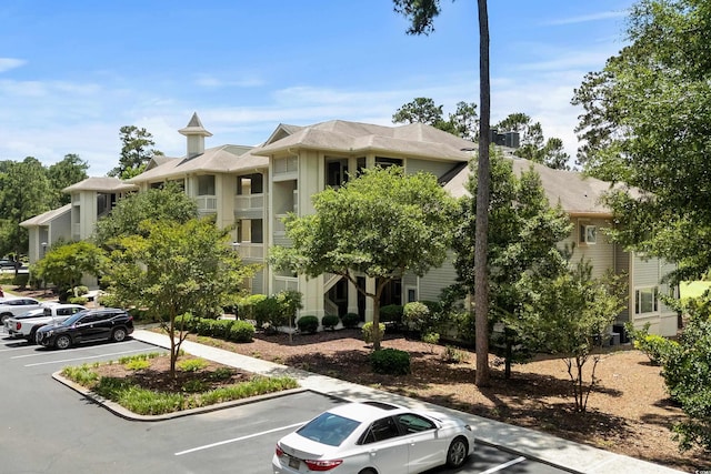 1551 Spinnaker Dr Unit 5312, North Myrtle Beach, SC 29582 - view of property featuring uncovered parking