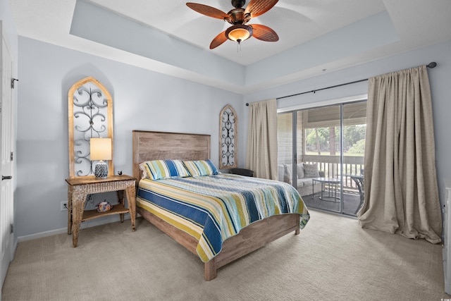 1551 Spinnaker Dr Unit 5312, North Myrtle Beach, SC 29582 - carpeted bedroom featuring access to outside, a tray ceiling, and a ceiling fan