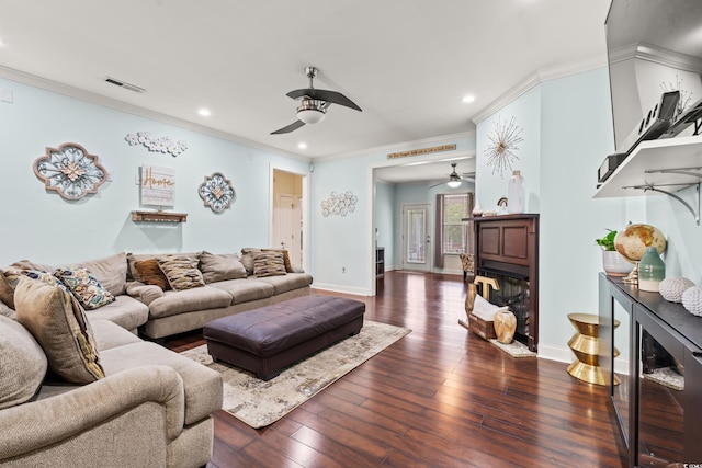 1051 Academy Dr, Conway, SC 29526 - living room with a ceiling fan, recessed lighting, ornamental molding, dark wood-type flooring, and baseboards
