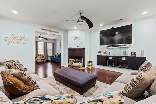 1051 Academy Dr, Conway, SC 29526 - living area featuring a ceiling fan, ornamental molding, wood finished floors, recessed lighting, and a fireplace