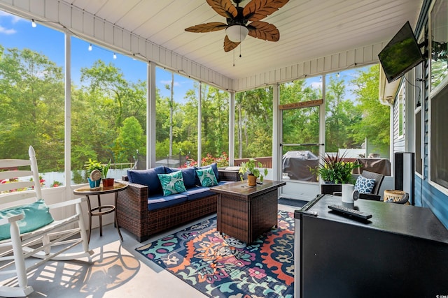 1051 Academy Dr, Conway, SC 29526 - sunroom / solarium with outdoor lounge area, a ceiling fan, and view of wooded area