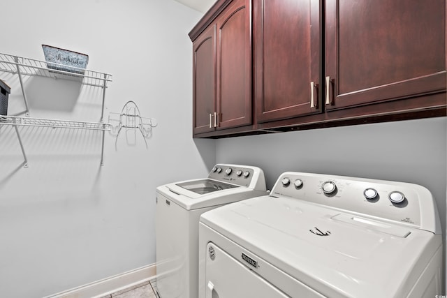 1051 Academy Dr, Conway, SC 29526 - laundry area featuring washing machine and clothes dryer, cabinet space, and baseboards