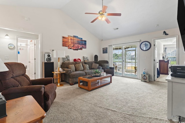 1068 Lizzie Ln, Surfside Beach, SC 29575 - carpeted living room featuring lofted ceiling and a ceiling fan
