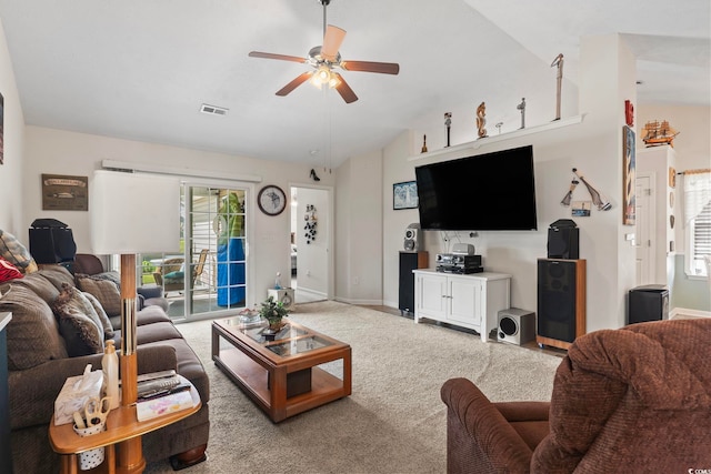 1068 Lizzie Ln, Surfside Beach, SC 29575 - living room featuring ceiling fan, vaulted ceiling, baseboards, and light carpet
