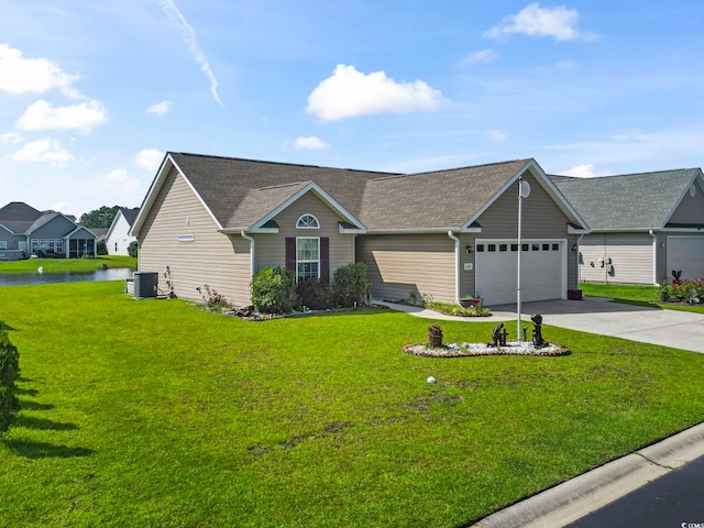 1068 Lizzie Ln, Surfside Beach, SC 29575 - view of front of house featuring central AC, roof with shingles, a garage, a water view, and driveway