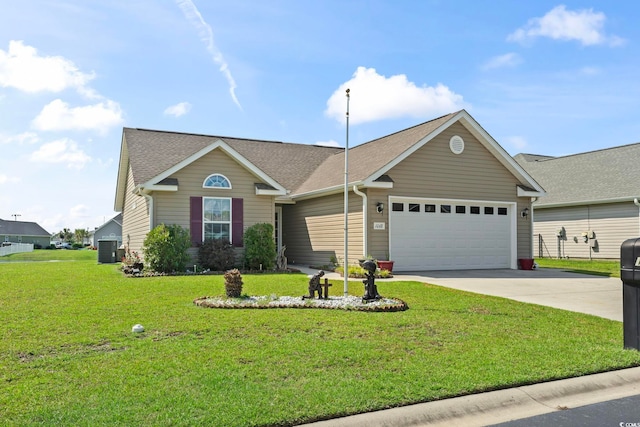 1068 Lizzie Ln, Surfside Beach, SC 29575 - view of front of house featuring an attached garage, concrete driveway, a front yard, central AC, and roof with shingles