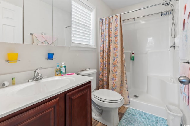 1068 Lizzie Ln, Surfside Beach, SC 29575 - bathroom with toilet, vanity, and a shower with curtain