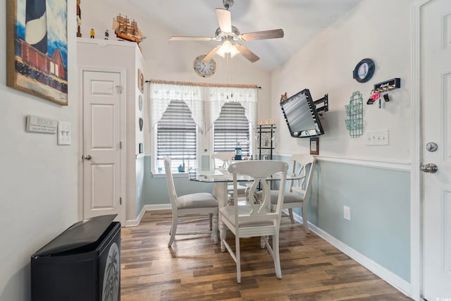 1068 Lizzie Ln, Surfside Beach, SC 29575 - dining area featuring a ceiling fan, vaulted ceiling, wood finished floors, baseboards, and a desk
