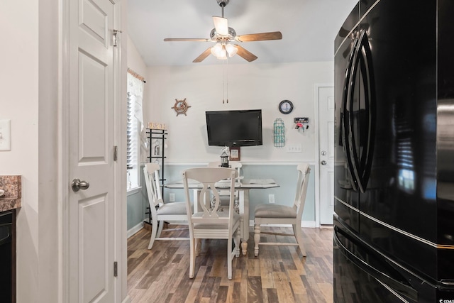 1068 Lizzie Ln, Surfside Beach, SC 29575 - dining area featuring ceiling fan, wood finished floors, and baseboards