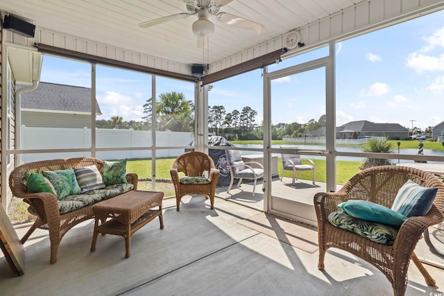 1068 Lizzie Ln, Surfside Beach, SC 29575 - sunroom featuring ceiling fan, a water view, and outdoor lounge area