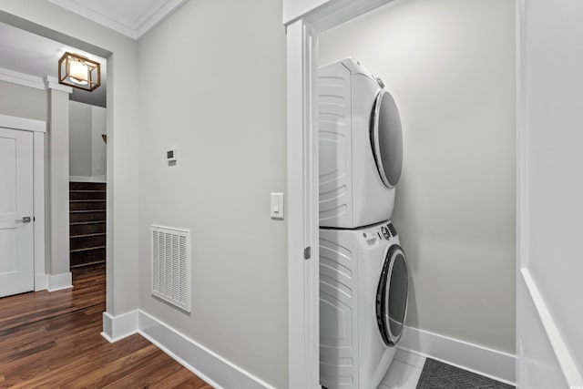 433 Saint Julian Ln, Myrtle Beach, SC 29579 - washroom with stacked washer / dryer, crown molding, baseboards, and wood finished floors
