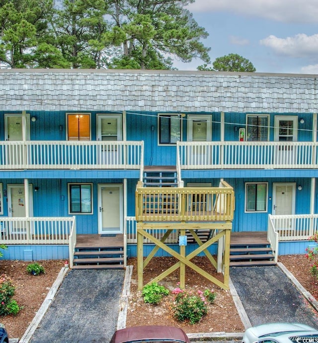 610 Putters Ln Unit H209, Little River, SC 29566 - multi unit property featuring covered porch, a balcony, and stairway