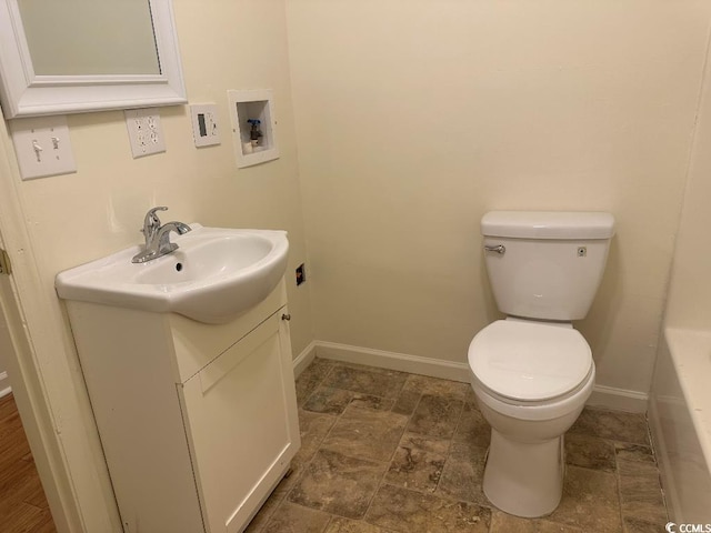610 Putters Ln Unit H209, Little River, SC 29566 - bathroom with vanity, a bath, and stone finish floors