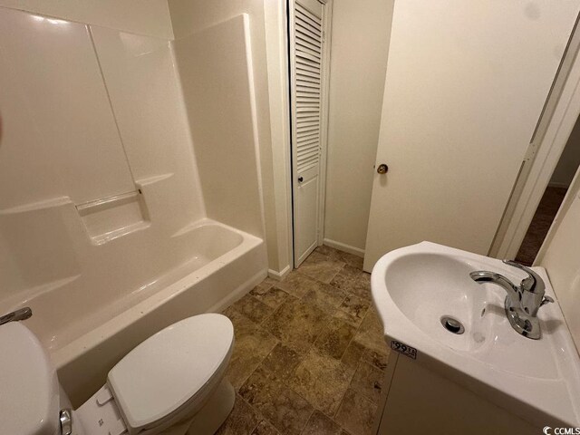 610 Putters Ln Unit H209, Little River, SC 29566 - full bathroom with stone finish flooring, vanity, and bathtub / shower combination
