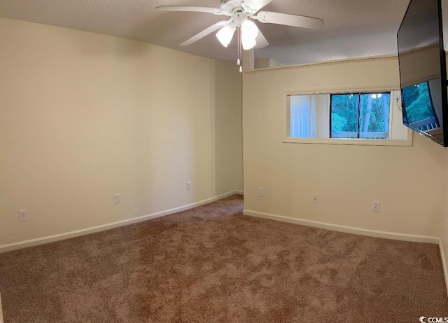 610 Putters Ln Unit H209, Little River, SC 29566 - spare room featuring a ceiling fan and carpet floors
