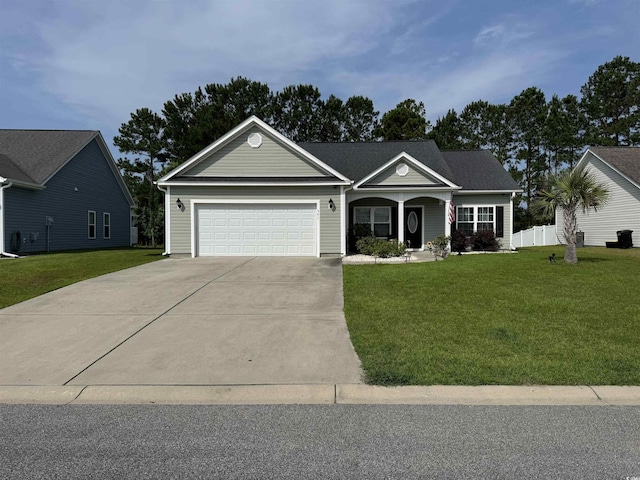 541 Irees Way, Longs, SC 29568 - ranch-style home featuring a garage, concrete driveway, and covered porch
