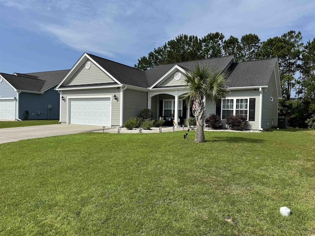541 Irees Way, Longs, SC 29568 - ranch-style home with an attached garage, driveway, covered porch, a front lawn, and central AC unit