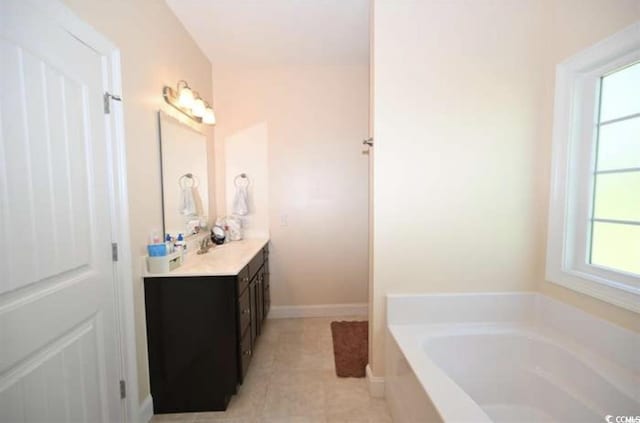 541 Irees Way, Longs, SC 29568 - full bath featuring vanity, a bath, tile patterned floors, and baseboards