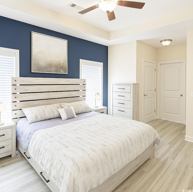541 Irees Way, Longs, SC 29568 - bedroom featuring light wood-style floors, a ceiling fan, and baseboards