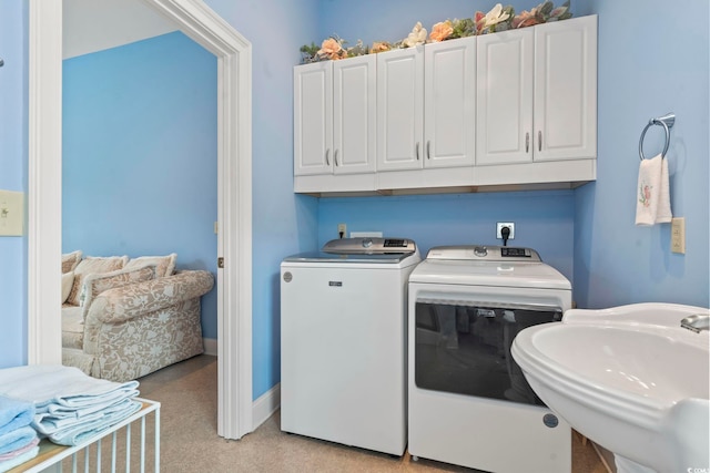 1501 Harbor Dr, North Myrtle Beach, SC 29582 - washroom with separate washer and dryer, a sink, and light colored carpet
