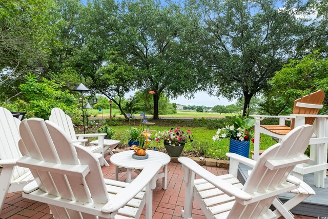 1501 Harbor Dr, North Myrtle Beach, SC 29582 - wooden terrace with a patio