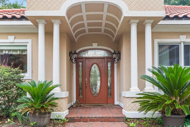 1501 Harbor Dr, North Myrtle Beach, SC 29582 - doorway to property featuring a tiled roof and stucco siding