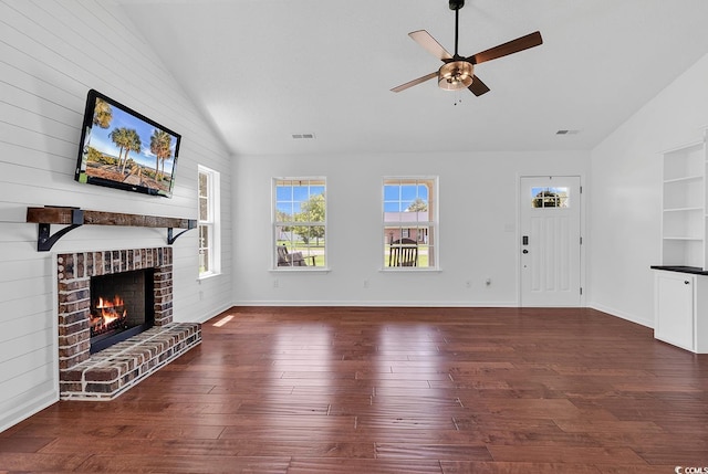 553 Fox Chase Dr, Conway, SC 29527 - unfurnished living room with lofted ceiling, a ceiling fan, a brick fireplace, wood finished floors, and baseboards