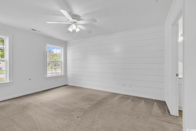 553 Fox Chase Dr, Conway, SC 29527 - unfurnished room featuring plenty of natural light, carpet flooring, crown molding, a ceiling fan, and baseboards