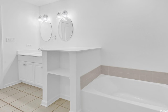 553 Fox Chase Dr, Conway, SC 29527 - bathroom featuring tile patterned floors, vanity, a bath, and baseboards