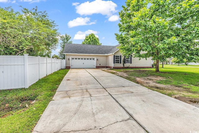 553 Fox Chase Dr, Conway, SC 29527 - view of front of property featuring an attached garage, concrete driveway, and roof with shingles
