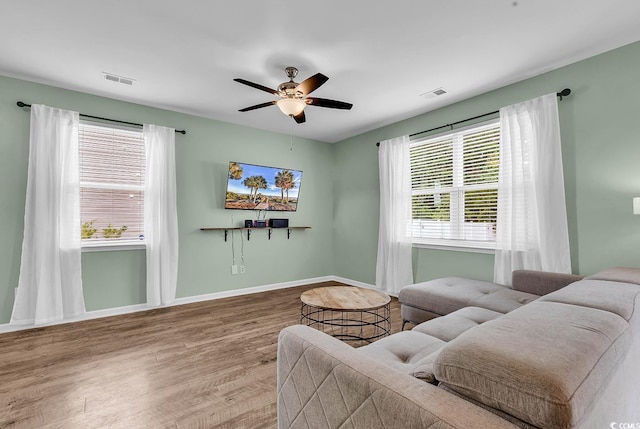 408 Carmello Cir, Conway, SC 29526 - living area featuring wood finished floors, baseboards, and ceiling fan