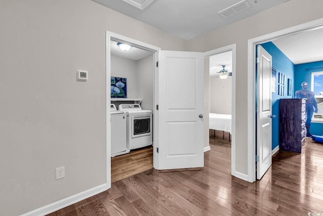 408 Carmello Cir, Conway, SC 29526 - corridor featuring separate washer and dryer, wood finished floors, and baseboards