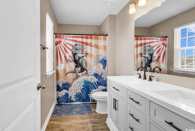 408 Carmello Cir, Conway, SC 29526 - bathroom with toilet, wood finished floors, double vanity, baseboards, and a shower with curtain