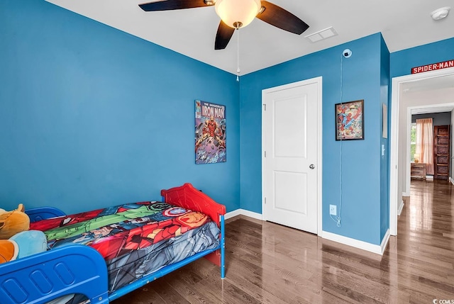 408 Carmello Cir, Conway, SC 29526 - bedroom with wood finished floors, baseboards, and ceiling fan