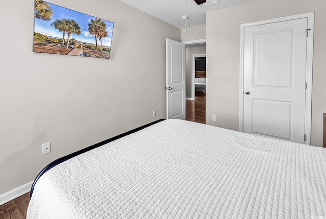 408 Carmello Cir, Conway, SC 29526 - bedroom with baseboards and dark wood-style flooring