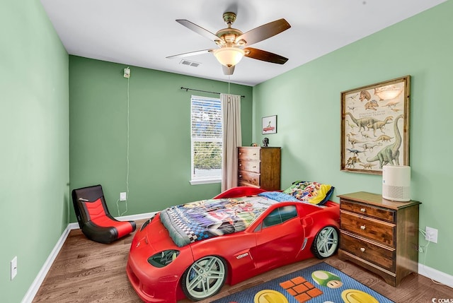 408 Carmello Cir, Conway, SC 29526 - bedroom featuring wood finished floors, baseboards, and a ceiling fan