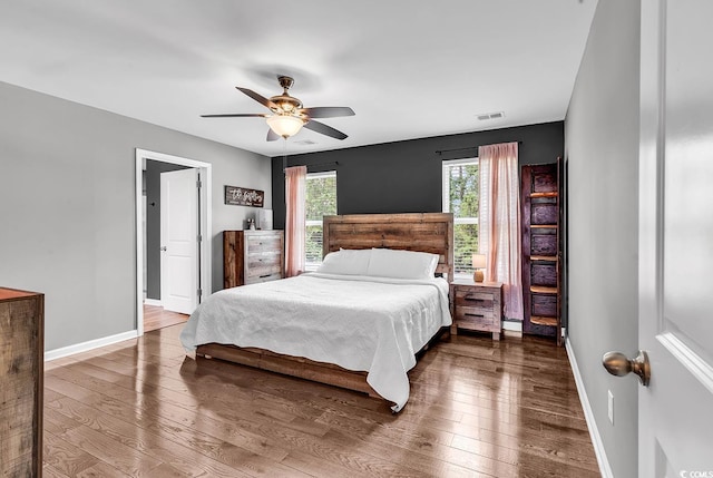 408 Carmello Cir, Conway, SC 29526 - bedroom featuring wood-type flooring, baseboards, and ceiling fan