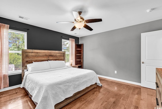 408 Carmello Cir, Conway, SC 29526 - bedroom with baseboards, wood finished floors, and ceiling fan