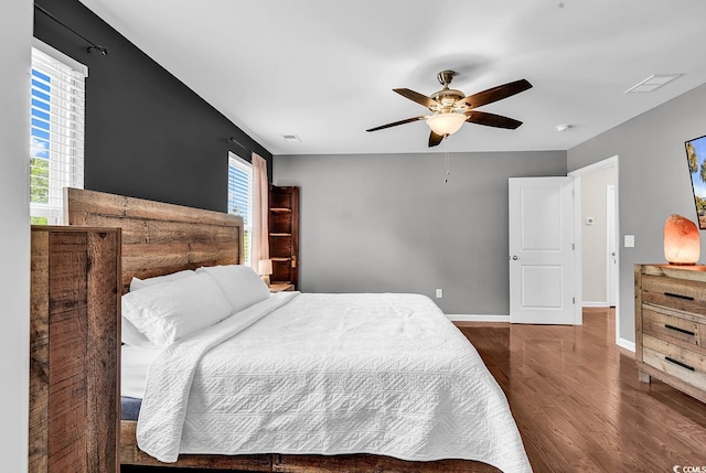 408 Carmello Cir, Conway, SC 29526 - bedroom with wood finished floors, baseboards, and ceiling fan
