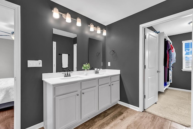 408 Carmello Cir, Conway, SC 29526 - full bath featuring double vanity, ensuite bath, wood finished floors, and baseboards