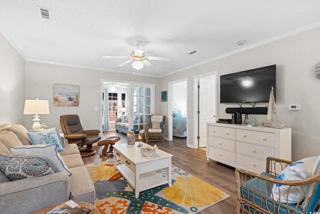 9776 Leyland Dr Unit 2, Myrtle Beach, SC 29572 - living area with wood finished floors, ceiling fan, ornamental molding, and baseboards