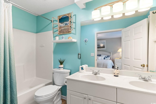 9776 Leyland Dr Unit 2, Myrtle Beach, SC 29572 - ensuite bathroom with double vanity, toilet, shower / bathtub combination with curtain, and a textured ceiling