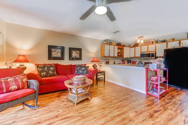 510 Fairwood Lakes Dr Unit 15-I, Myrtle Beach, SC 29588 - living room with light wood finished floors and ceiling fan