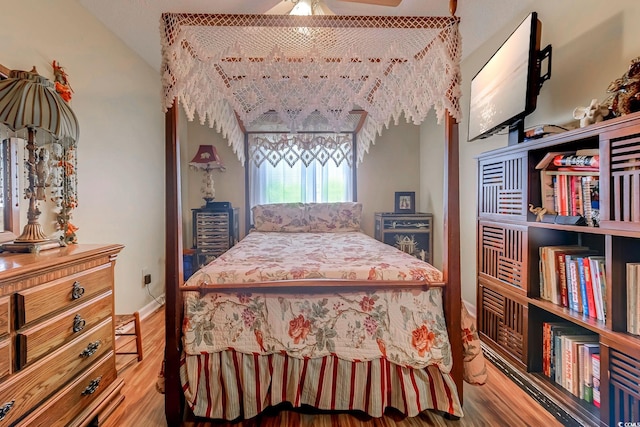 510 Fairwood Lakes Dr Unit 15-I, Myrtle Beach, SC 29588 - bedroom featuring wood finished floors, baseboards, and vaulted ceiling