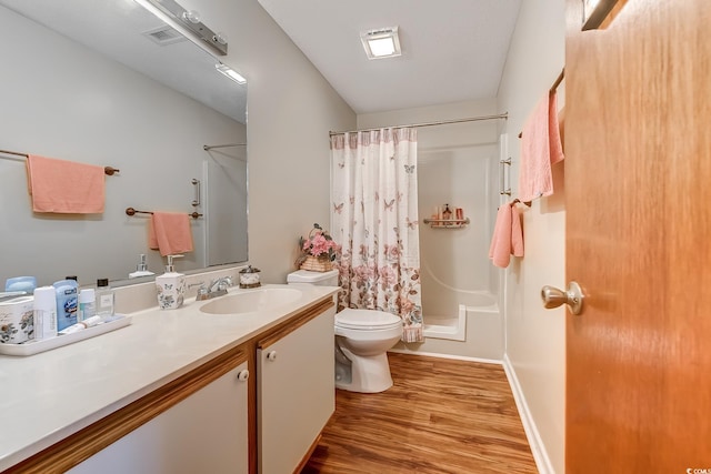 510 Fairwood Lakes Dr Unit 15-I, Myrtle Beach, SC 29588 - bathroom with toilet, vanity, wood finished floors, shower / tub combo with curtain, and baseboards