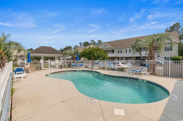 100 Lazy Willow Ln Unit 103, Myrtle Beach, SC 29588 - community pool with a patio area and a gazebo